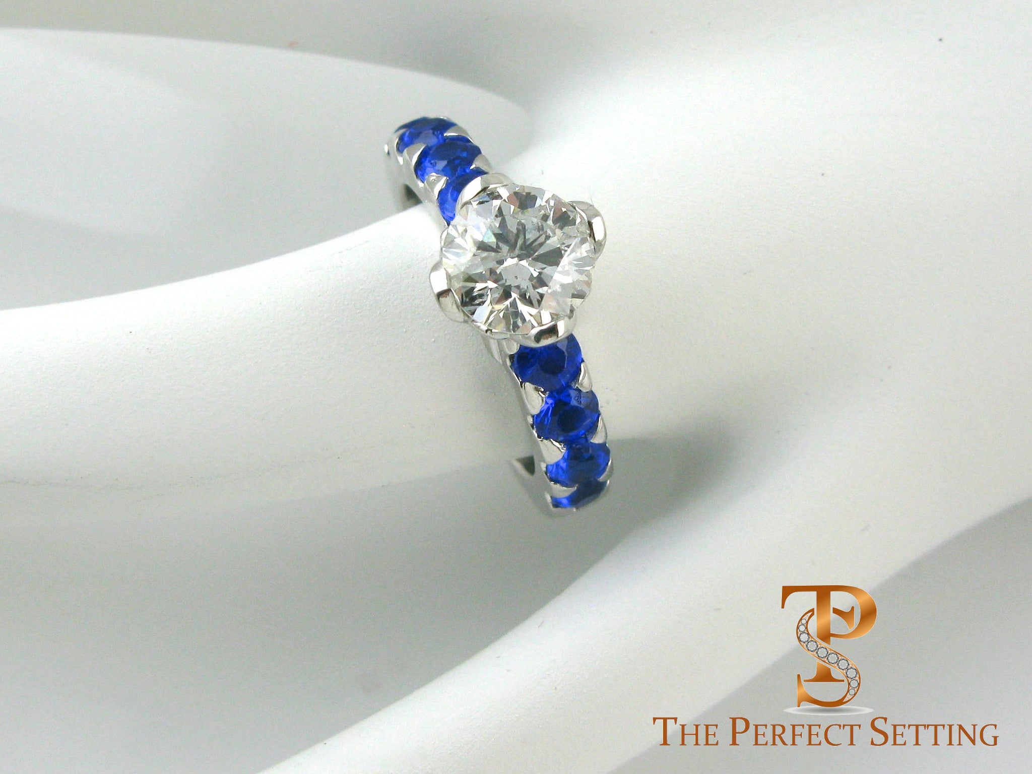 Lotus flower diamond and sapphire engagement ring
