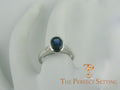 Bezel Set Oval Sapphire and Diamond Ring