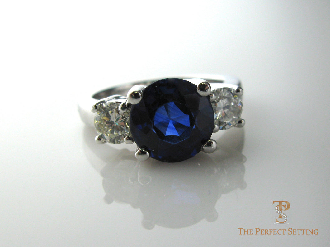 Three Stone ring Sapphire with two diamonds