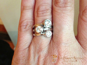three stone bezel ring diamonds on hand