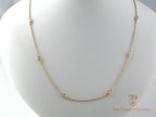 Diamonds bezel set on cable chain in 14K yellow gold